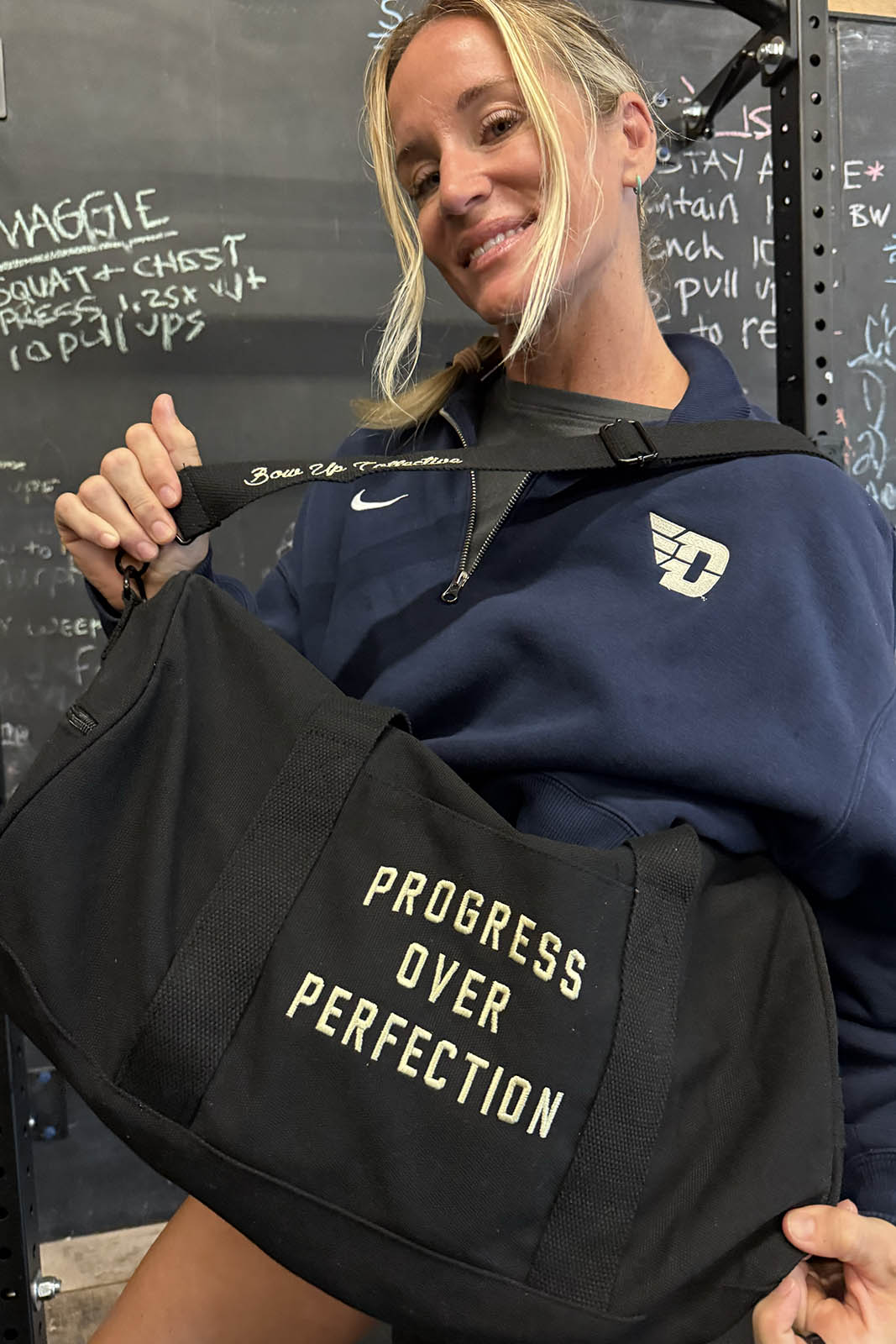 Progress over perfection duffel bag