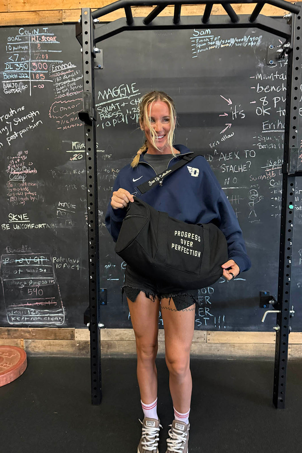 Progress over perfection duffel bag